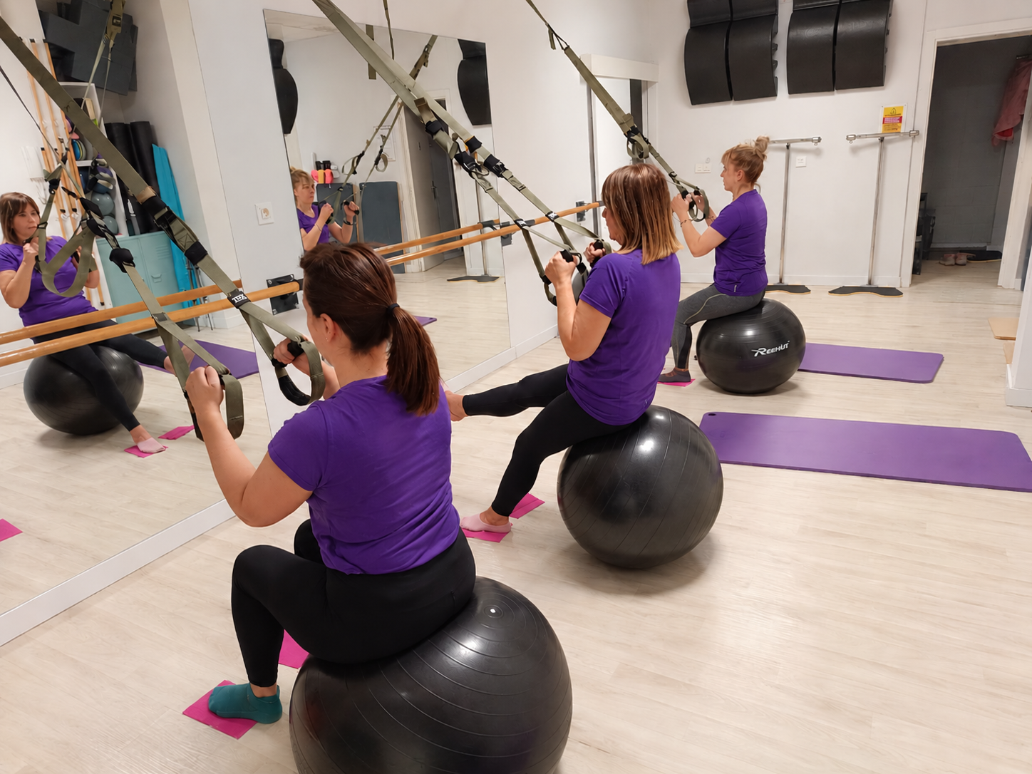 Clase de Pilates TRX en NOS Studio Pilates